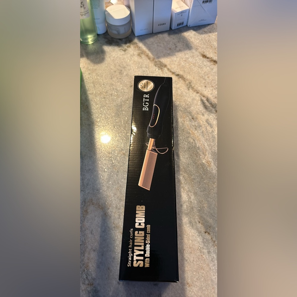 Heated Styling comb with double sided comb